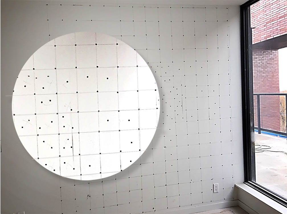 Fixation de cloisons sèches avec des clous en béton